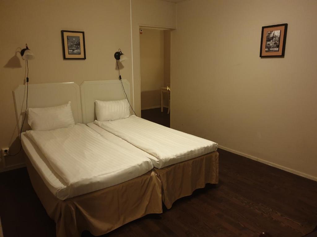 Postel nebo postele na pokoji v ubytování Hotel Expo Stockholm