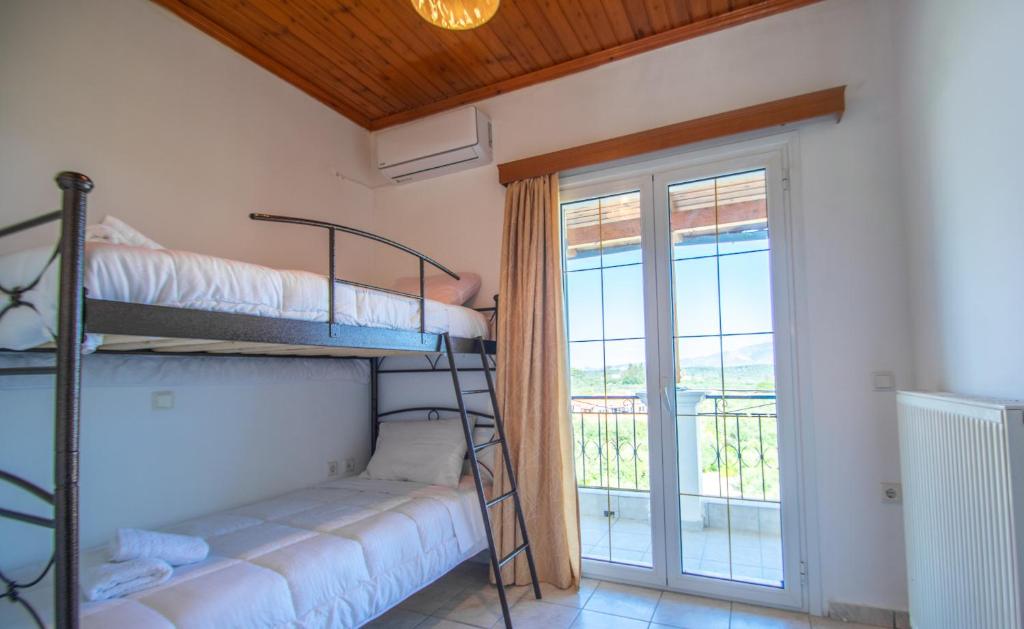 Posteľ alebo postele v izbe v ubytovaní Family Private Homes & Sea View by "elite"