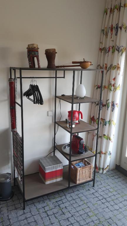 Palanda nebo palandy na pokoji v ubytování Biesbosch Bed & Breakfast Werkendam