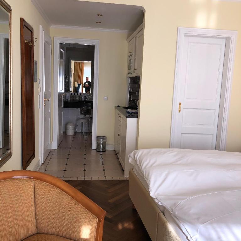 Postel nebo postele na pokoji v ubytování Hotel Scherf