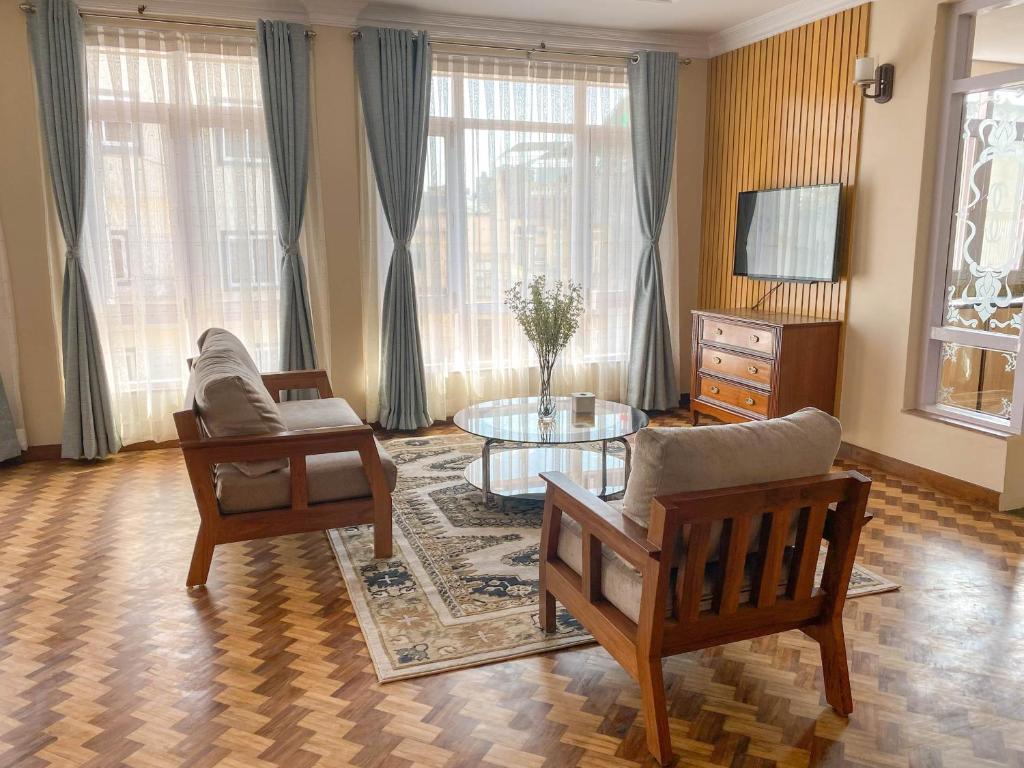 TV a/nebo společenská místnost v ubytování Kibu Home