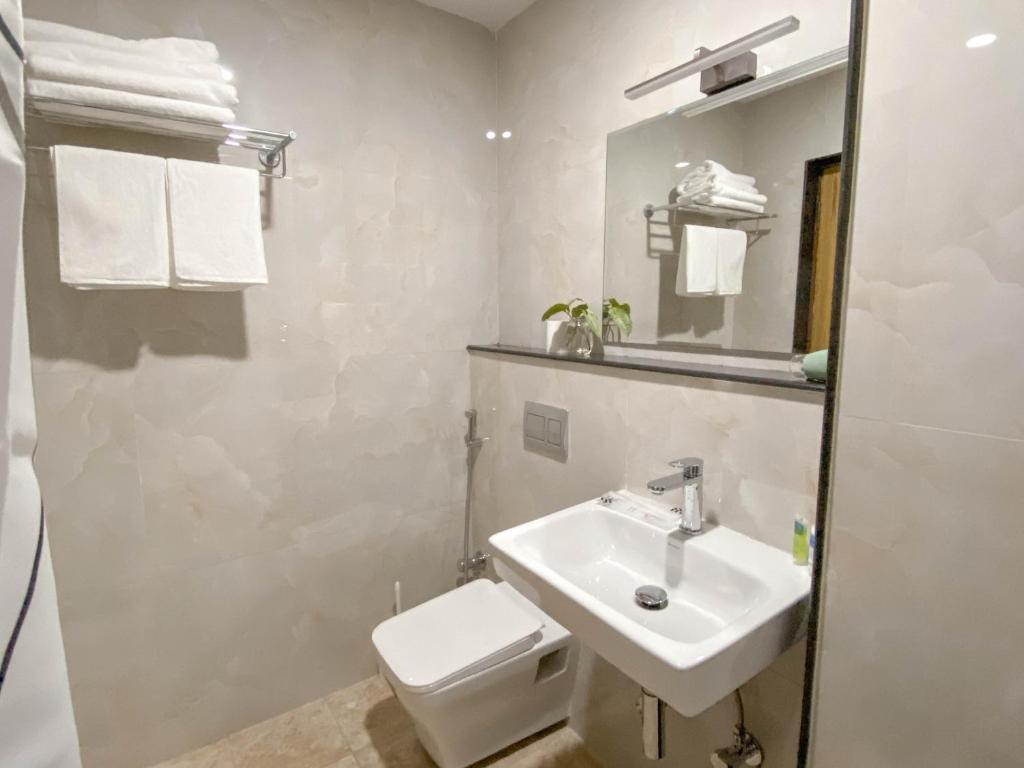 Koupelna v ubytování Kibu Home