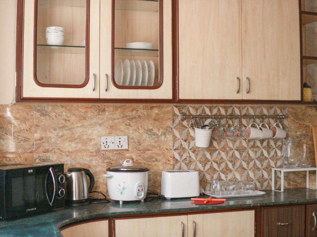 Kuchyň nebo kuchyňský kout v ubytování Kibu Home