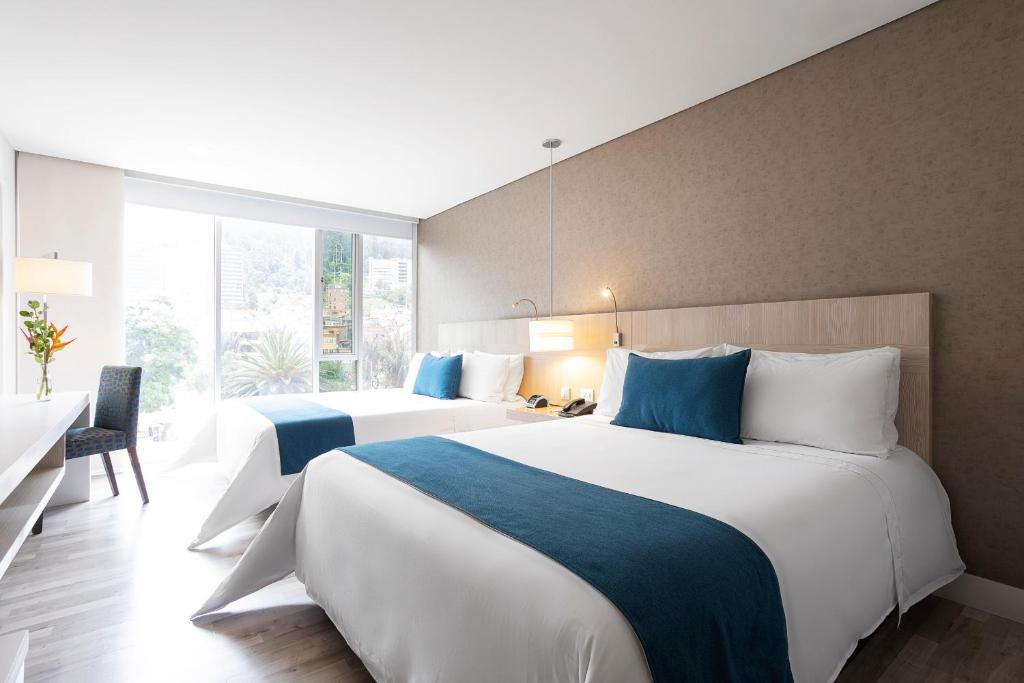 Postel nebo postele na pokoji v ubytování Hotel bh Bicentenario