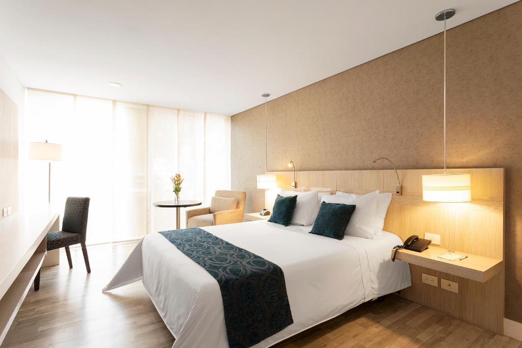 Postel nebo postele na pokoji v ubytování Hotel bh Bicentenario