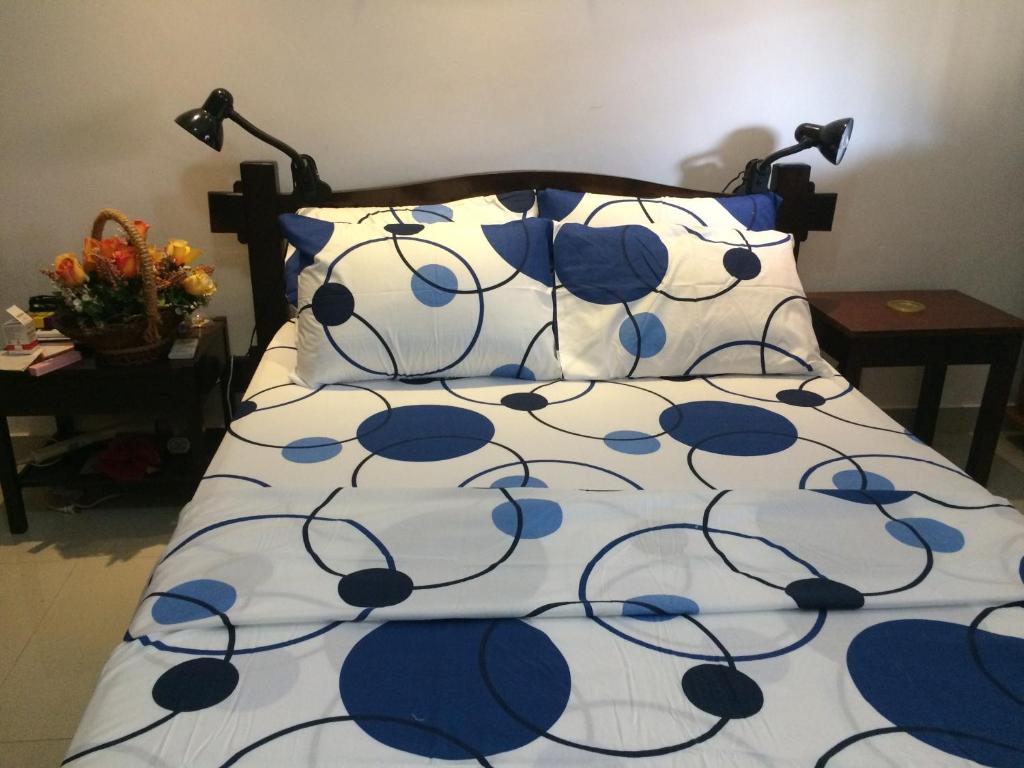 Uma cama ou camas num quarto em Hotel Pousada Chalé do Coqueiral