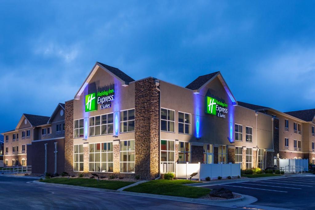 a rendering of a hotel at night at Holiday Inn Express & Suites Rapid City, an IHG Hotel in Rapid City