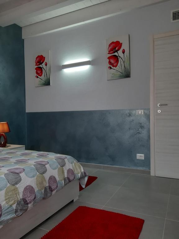 Łóżko lub łóżka w pokoju w obiekcie Villa Marianna Garda Lake