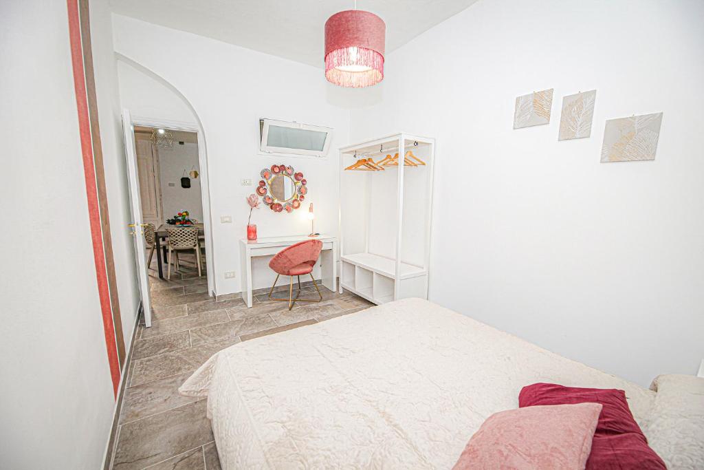 Łóżko lub łóżka w pokoju w obiekcie Casa Raffadali, in centro storico a Palermo