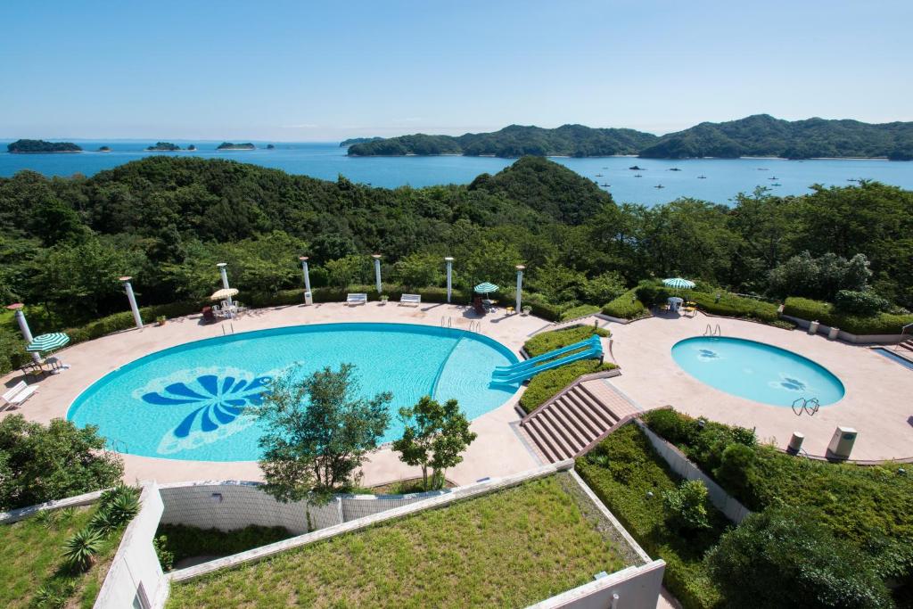 an overhead view of a pool with a view of the water at Ryoso Uminocho in Ise