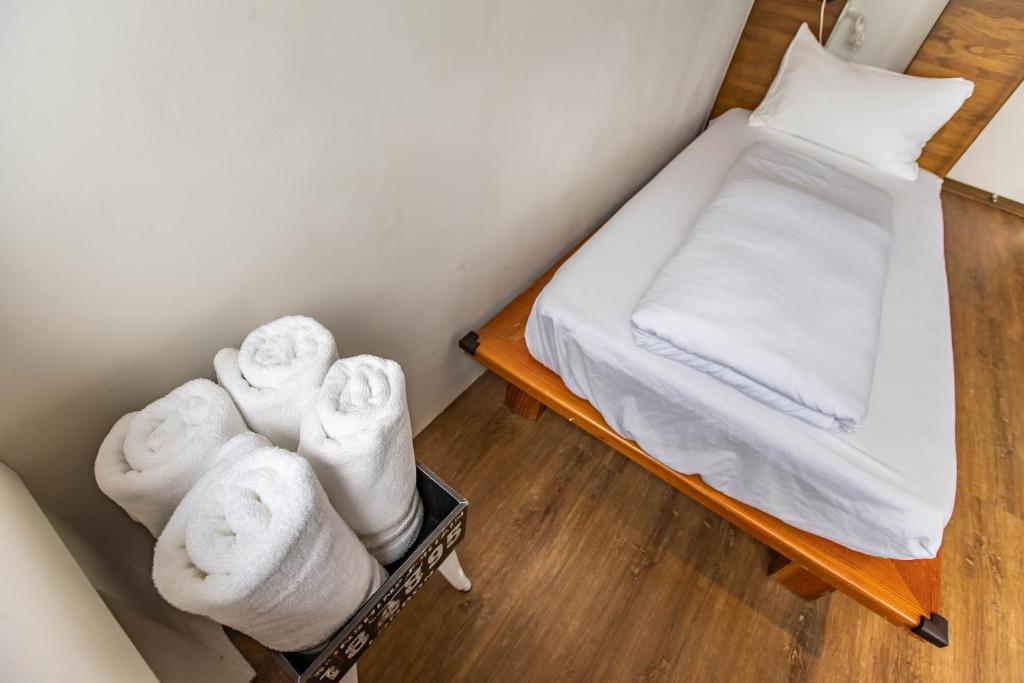 Postel nebo postele na pokoji v ubytování Mini Voyage Hostel