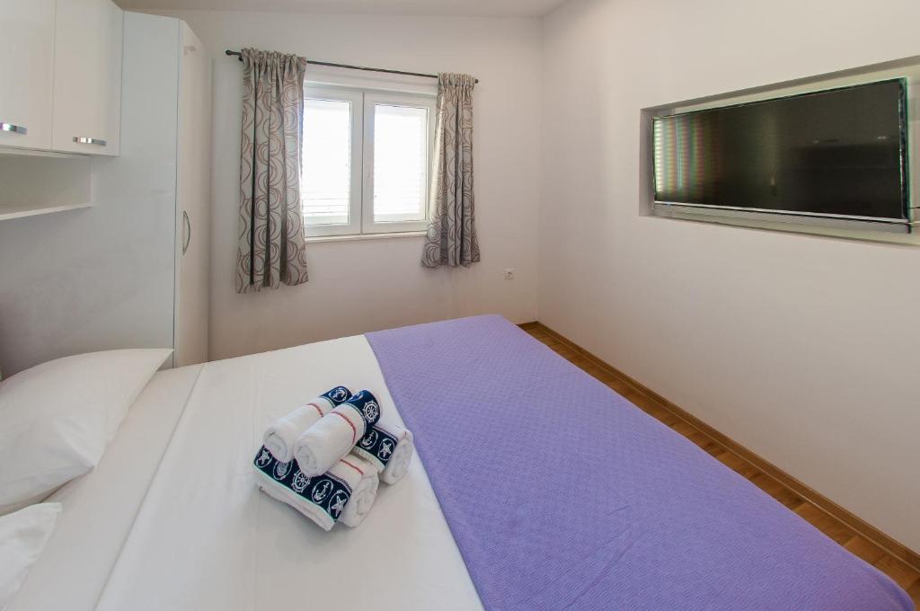 Postel nebo postele na pokoji v ubytování Apartments Anita