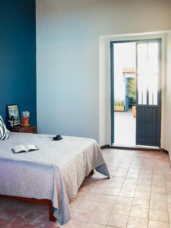 Postel nebo postele na pokoji v ubytování Casa Arrayan
