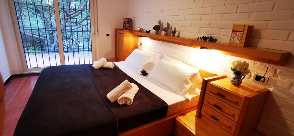 Postel nebo postele na pokoji v ubytování VILLAS COSETTE - Villa Julieta