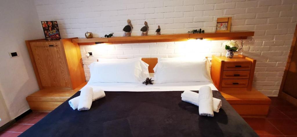 Postel nebo postele na pokoji v ubytování VILLAS COSETTE - Villa Julieta