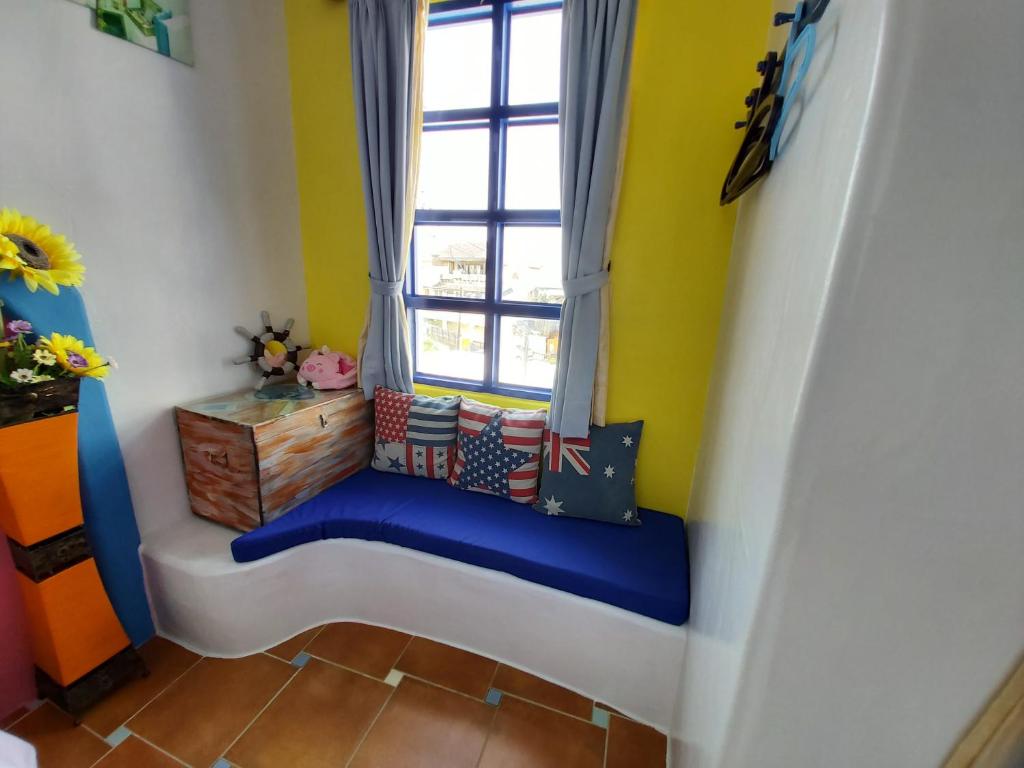 Posezení v ubytování Captain Homestay