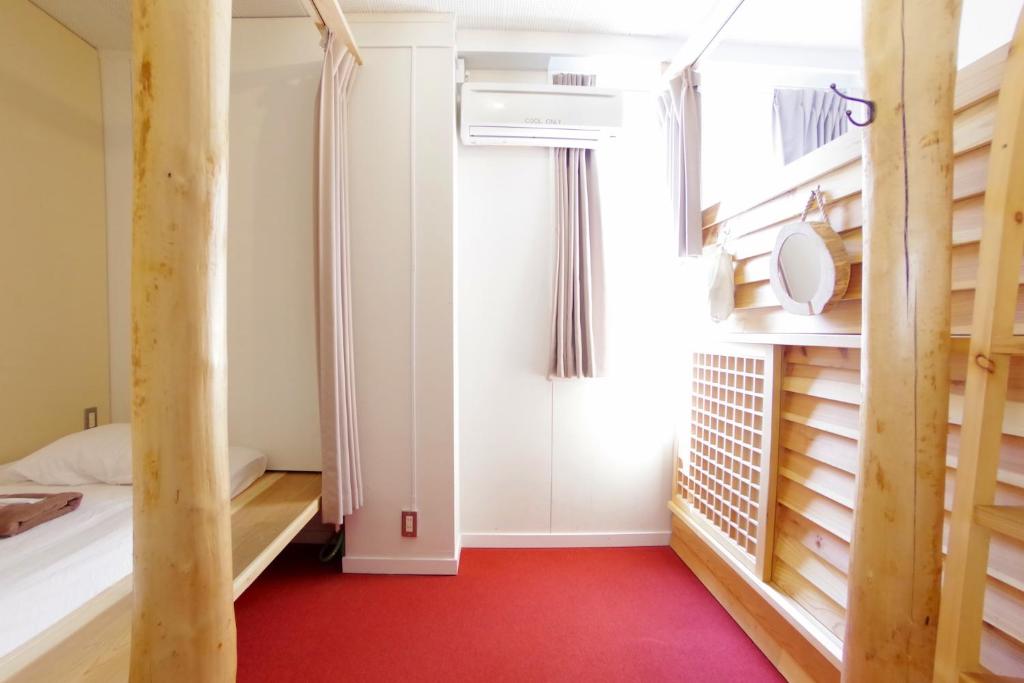 Postel nebo postele na pokoji v ubytování Hostel 1889