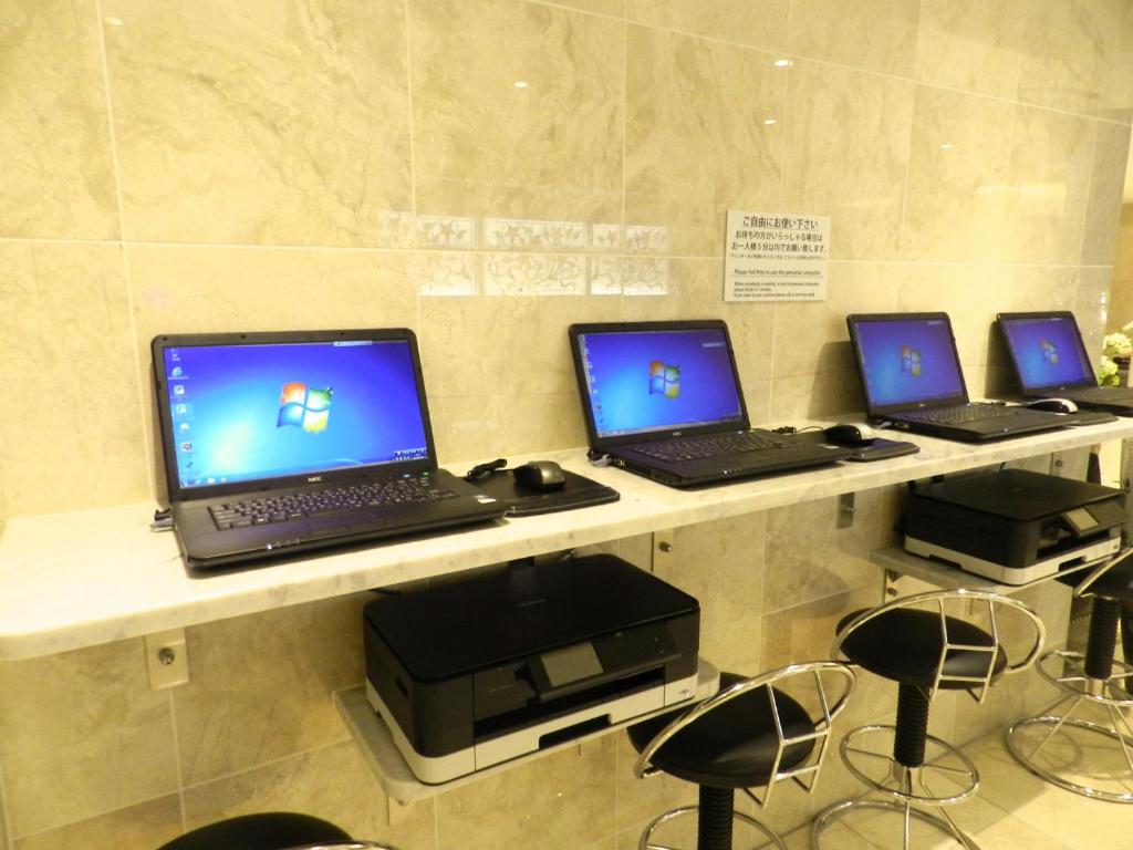 TV a/nebo společenská místnost v ubytování Check in Shijokarasuma