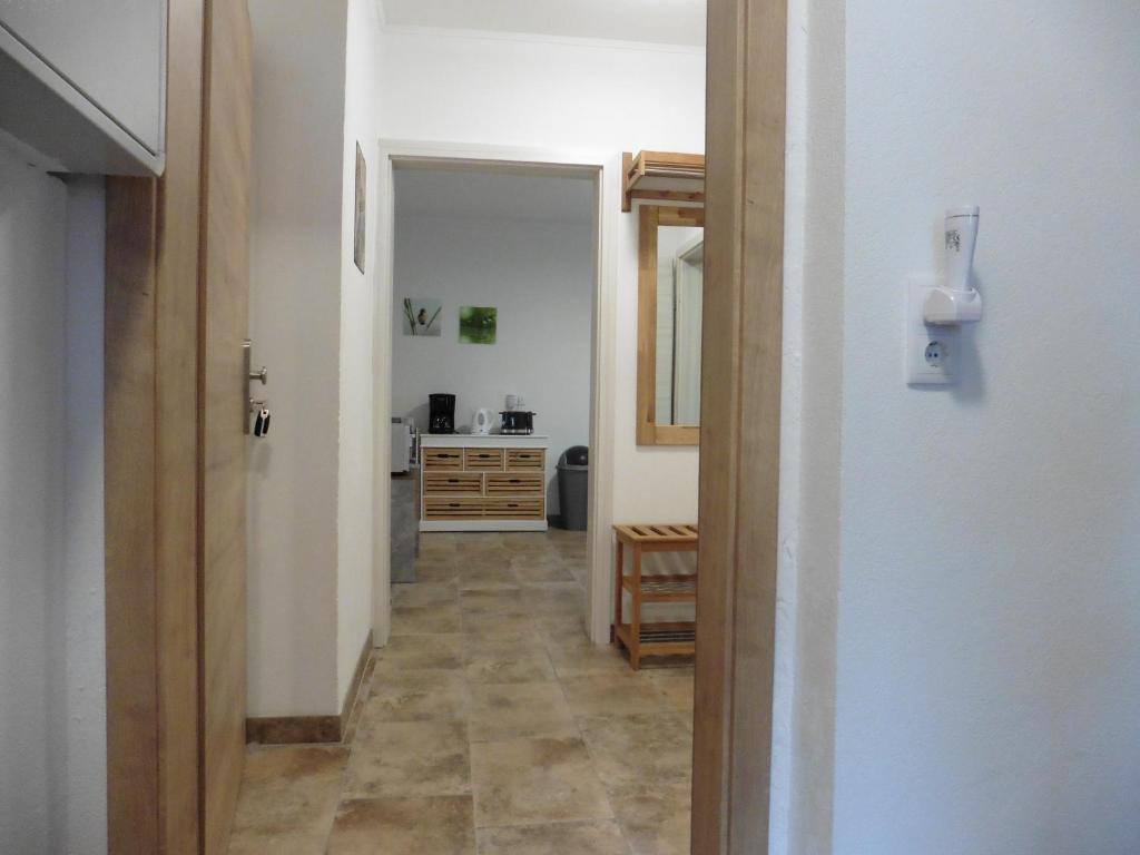 Televízia a/alebo spoločenská miestnosť v ubytovaní Moerth Apartment