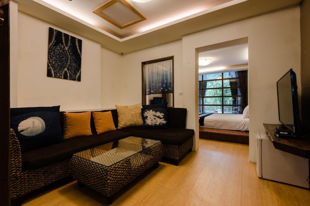 TV a/nebo společenská místnost v ubytování Zhou Ye Cottage