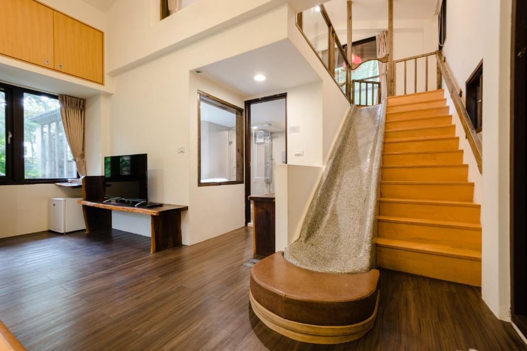 TV a/nebo společenská místnost v ubytování Zhou Ye Cottage
