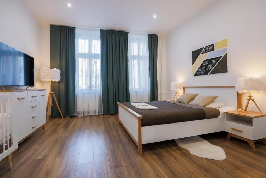 Postel nebo postele na pokoji v ubytování FAMILY Apartment OSTRAVA