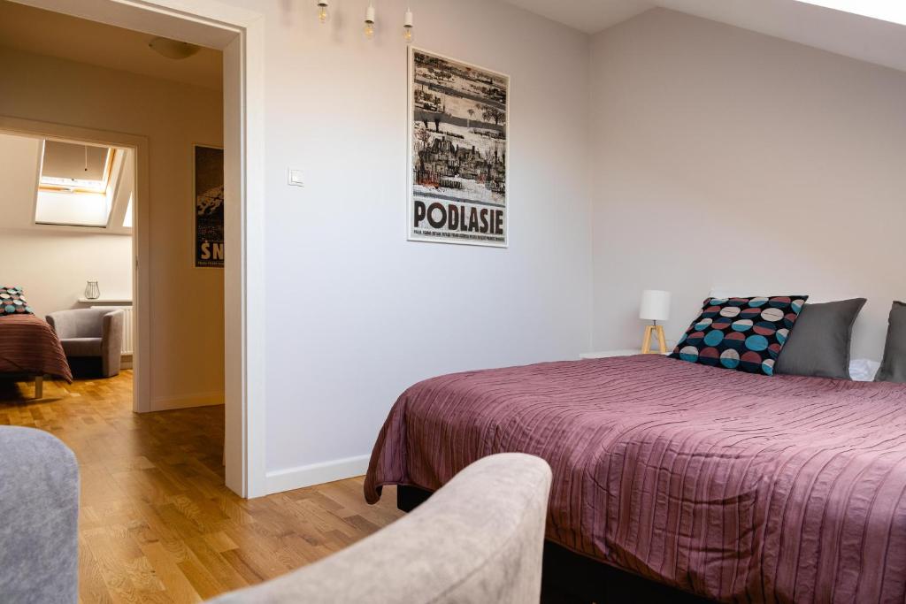 Posteľ alebo postele v izbe v ubytovaní Apartamenty Wczasowa
