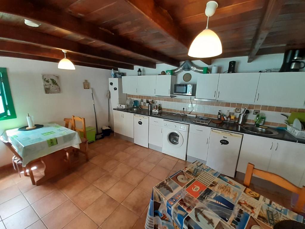 Kuchyňa alebo kuchynka v ubytovaní Cabañas Volcán Capellania