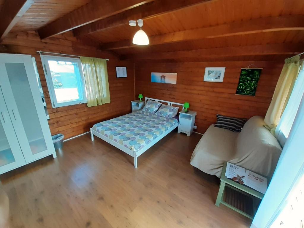 Posteľ alebo postele v izbe v ubytovaní Cabañas Volcán Capellania