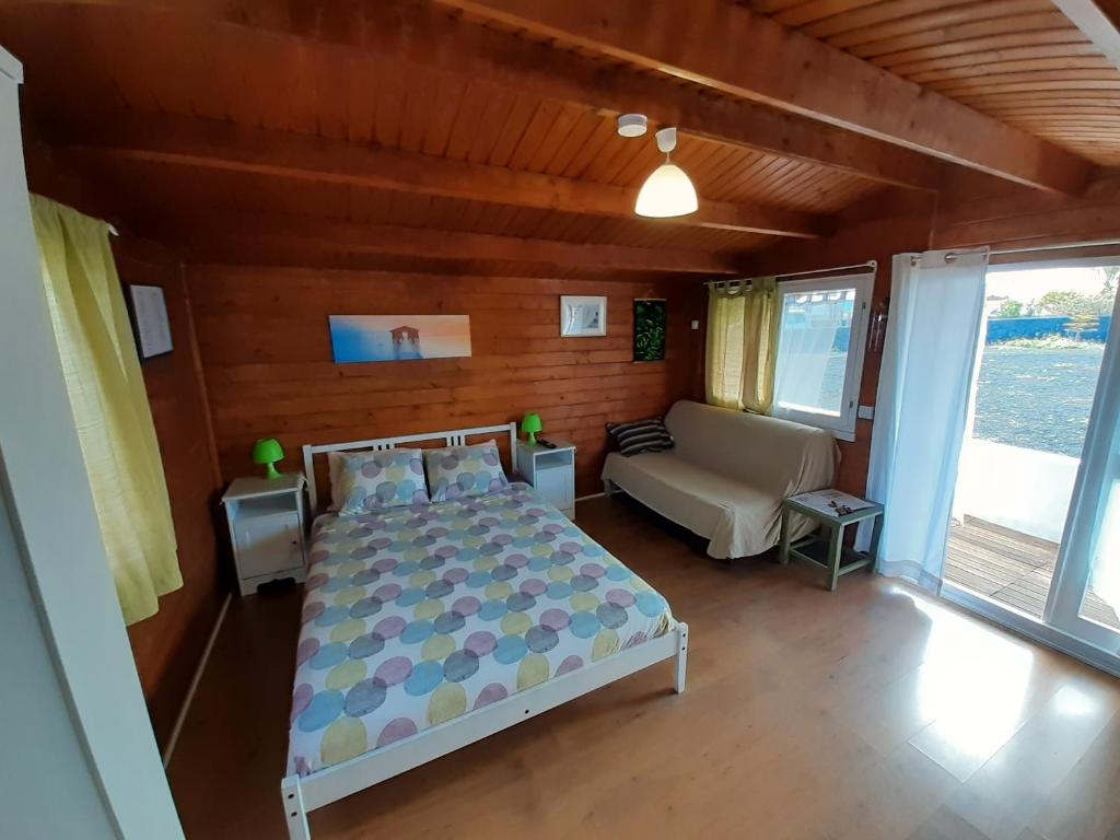 Posteľ alebo postele v izbe v ubytovaní Cabañas Volcán Capellania
