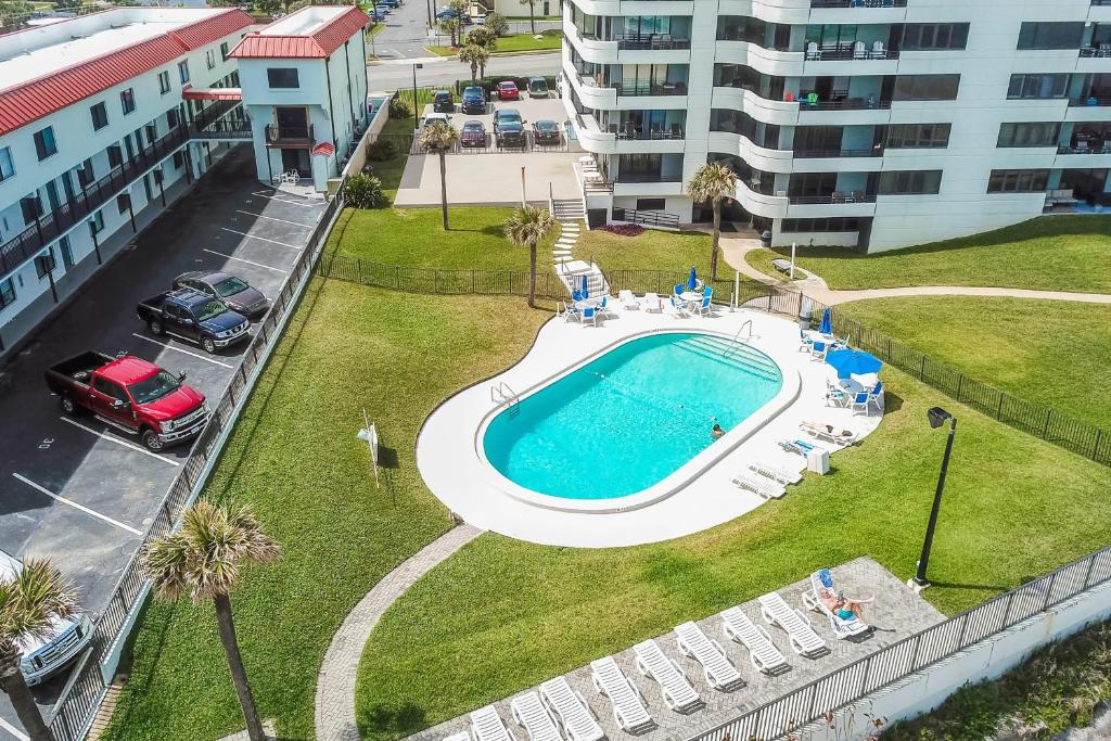 an overhead view of a swimming pool in a city at Horizons in Daytona Beach