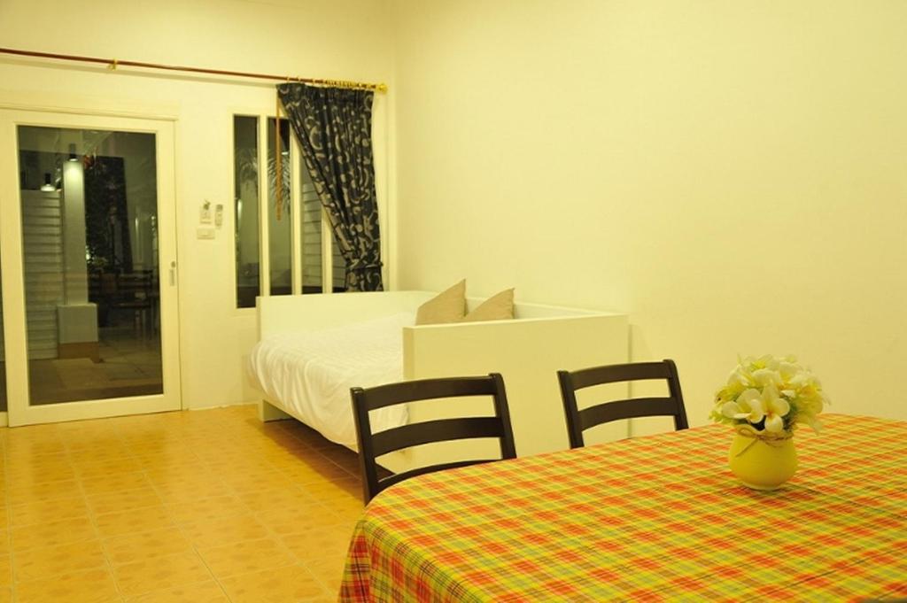 Postel nebo postele na pokoji v ubytování Clear House Phuket