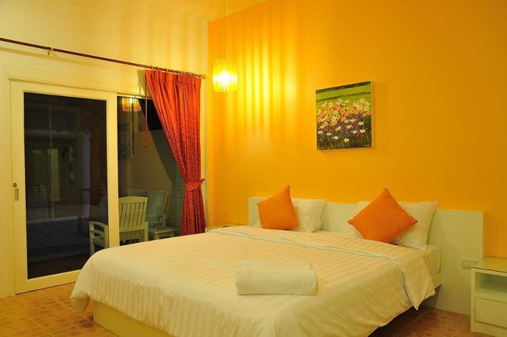 Postel nebo postele na pokoji v ubytování Clear House Phuket