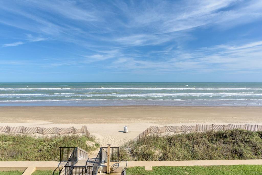 a view of a beach with the ocean in the background at Tiki 332 in South Padre Island