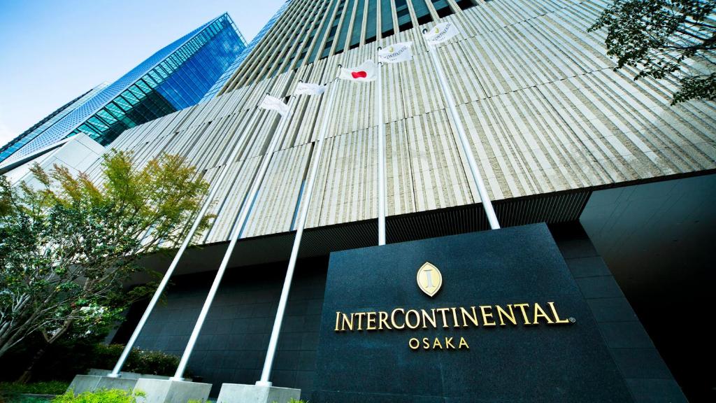 a large building with a clock on the front of it at InterContinental Hotel Osaka, an IHG Hotel in Osaka