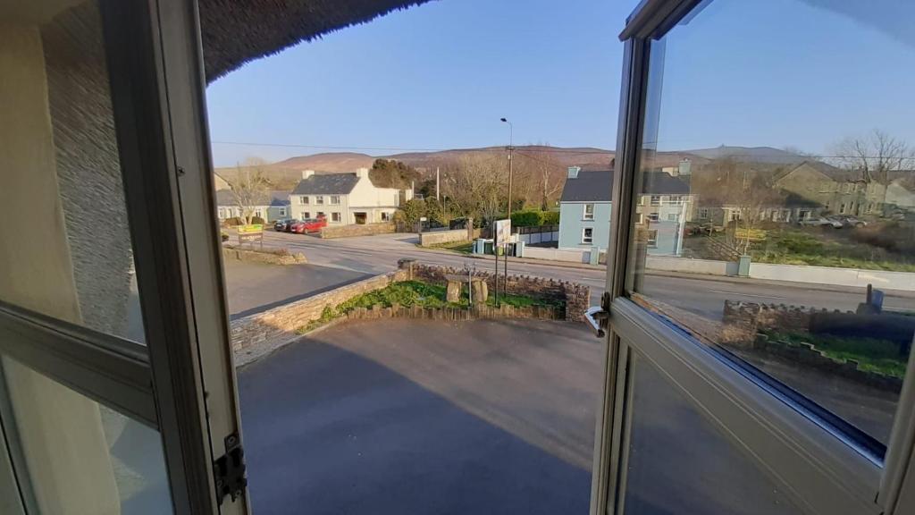 a view of a street from a window at Inspiration Lodge in Anascaul