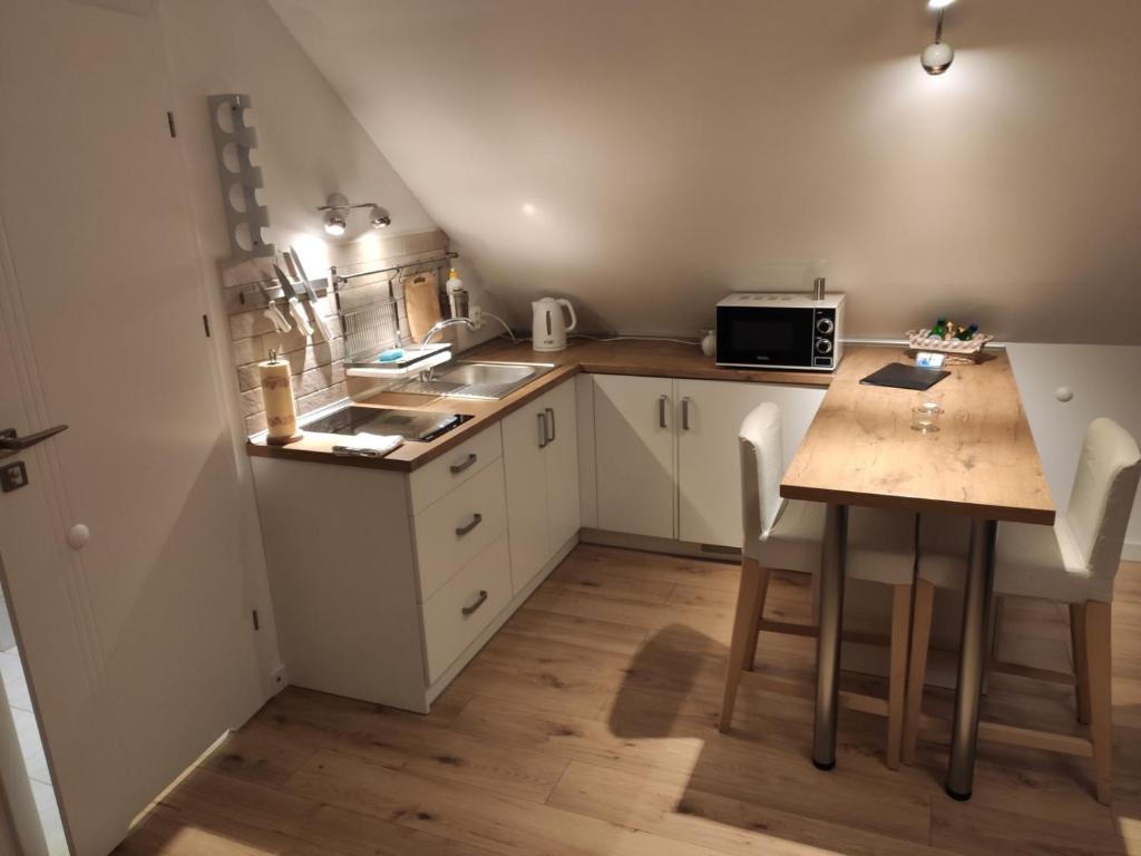 Kuchyňa alebo kuchynka v ubytovaní Pietrzak Apartments