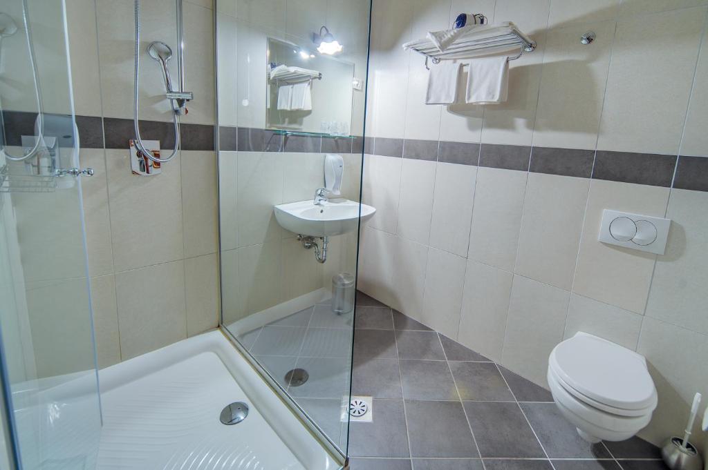 Koupelna v ubytování Parma Guesthouse & Apartments