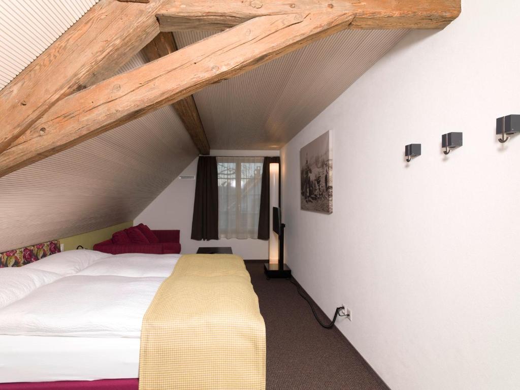 Postel nebo postele na pokoji v ubytování Gasthaus Sternen