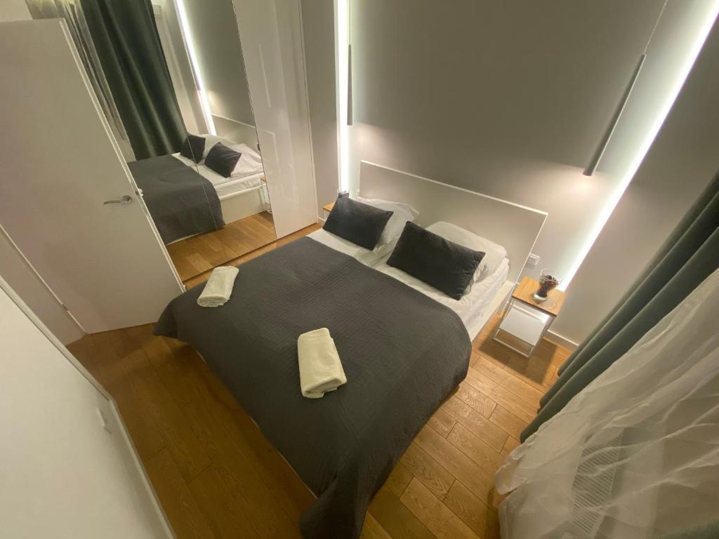 Postel nebo postele na pokoji v ubytování P&J Apartments Lubicz