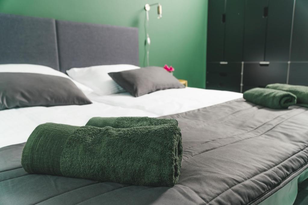 Postel nebo postele na pokoji v ubytování P&J Apartments Lubicz