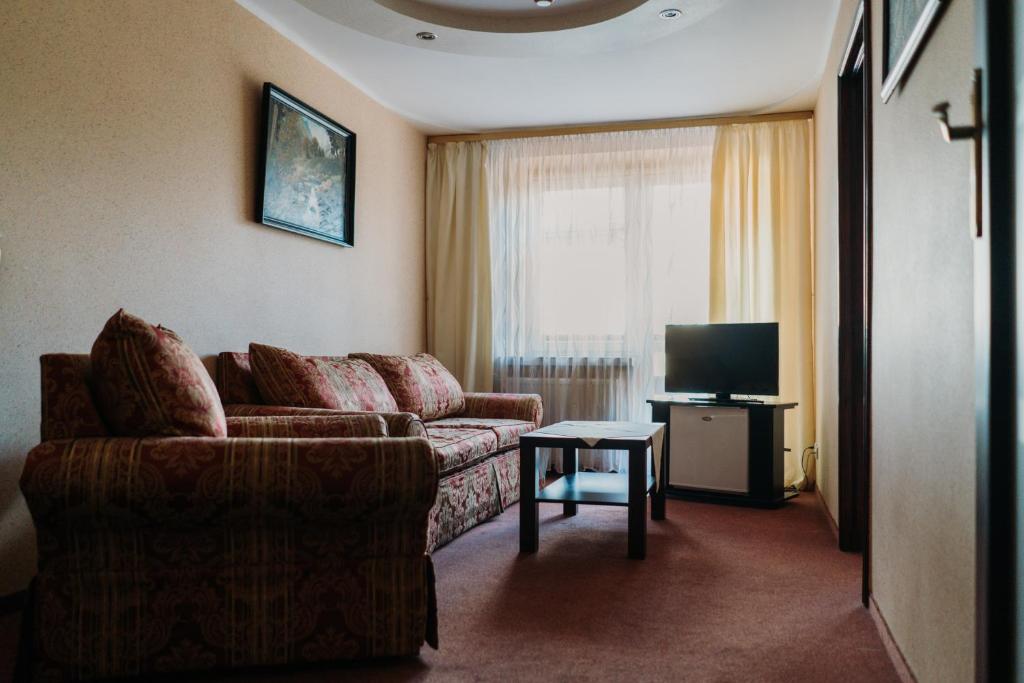 TV a/nebo společenská místnost v ubytování Hotel Kinga