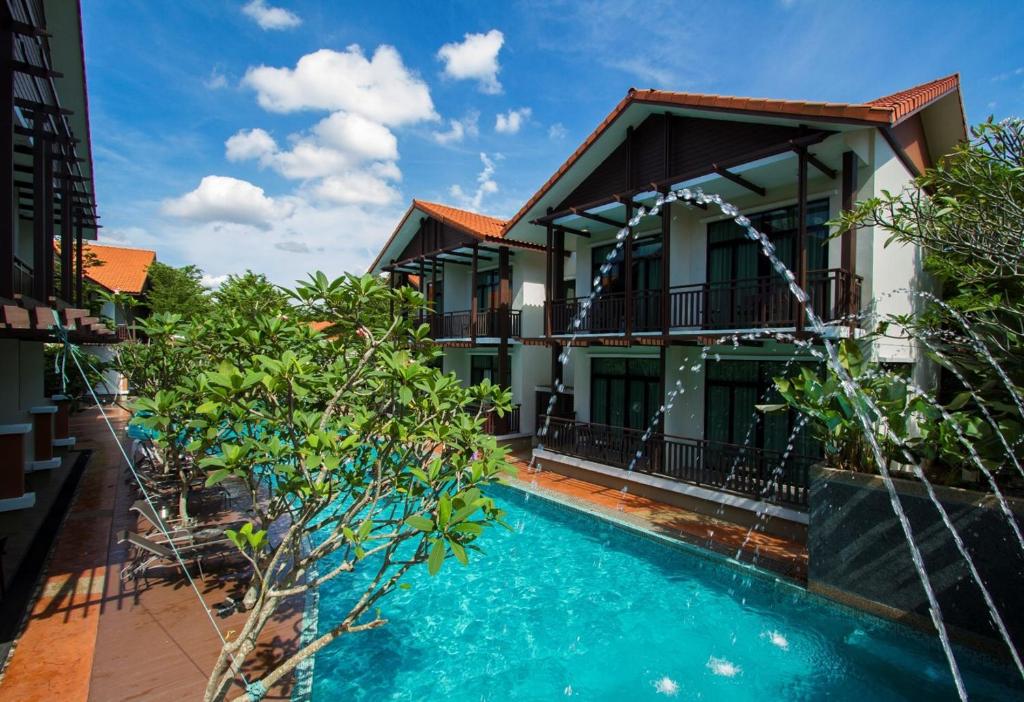 a view of a resort with a swimming pool at Espira Kinrara in Puchong