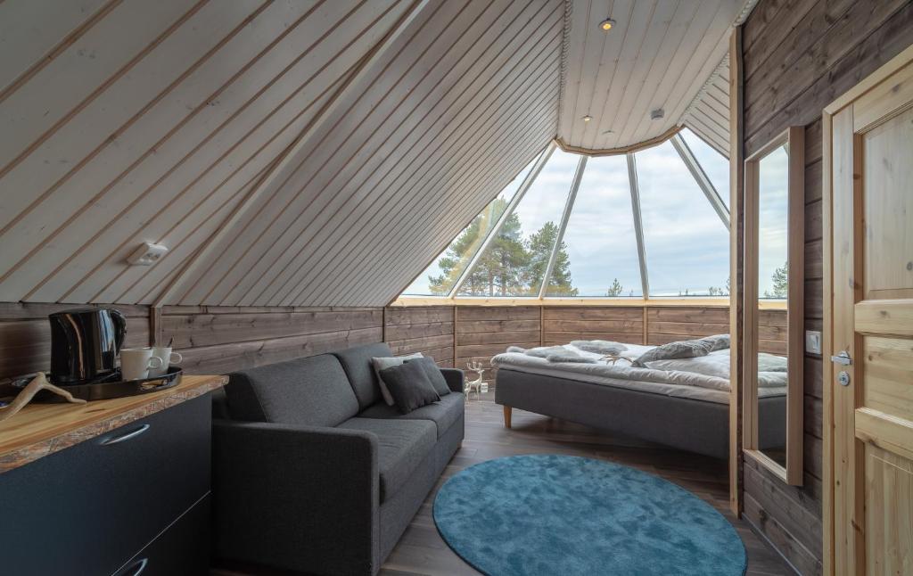 Postel nebo postele na pokoji v ubytování Wilderness Hotel Inari & Igloos