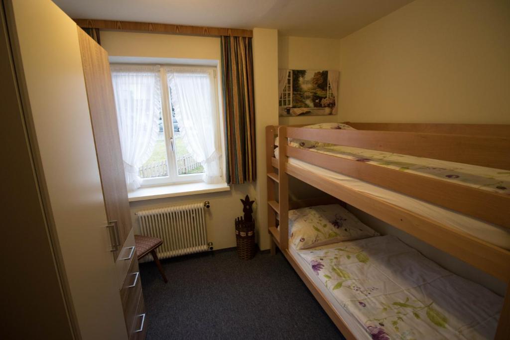 Postel nebo postele na pokoji v ubytování Haus Bergland