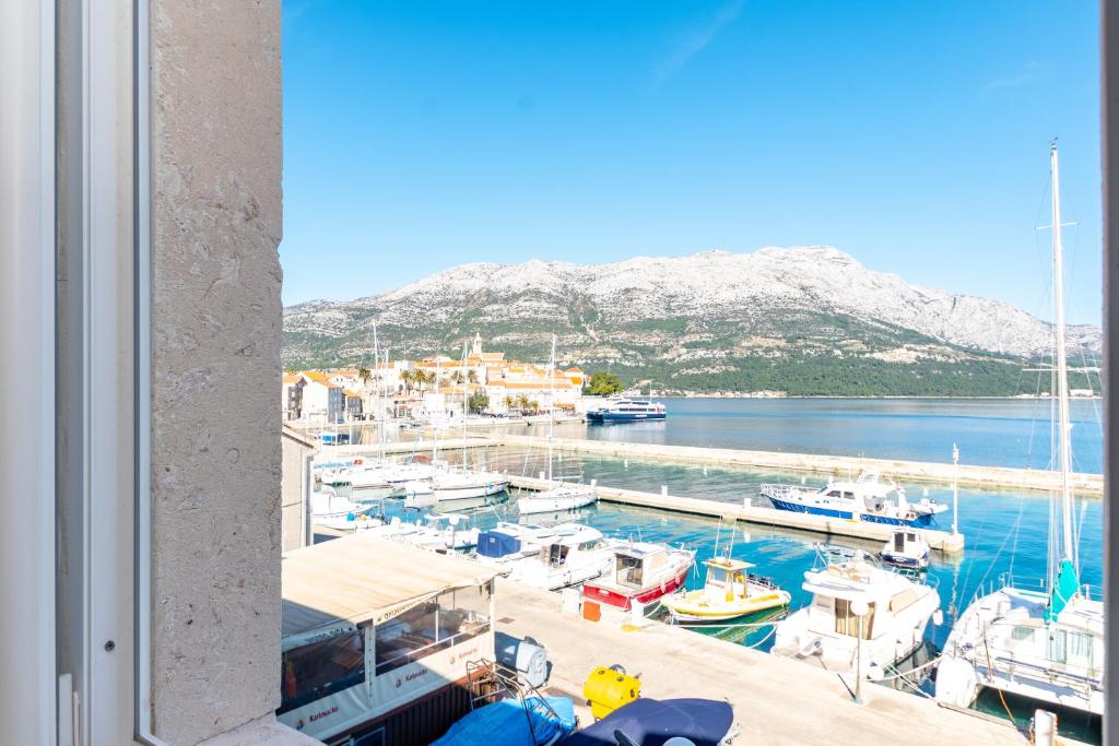 a view of a marina with boats in the water at Castello Rezidence Korcula in Korčula