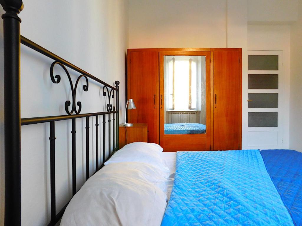 A bed or beds in a room at Welcome to alma's house, Levanto