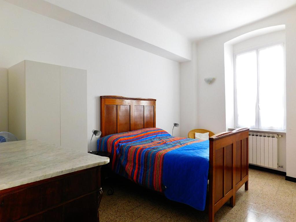 A bed or beds in a room at Welcome to alma's house, Levanto