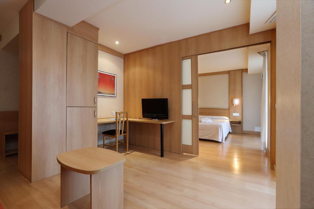 TV a/nebo společenská místnost v ubytování Hotel Guitart Central Park Aqua Resort