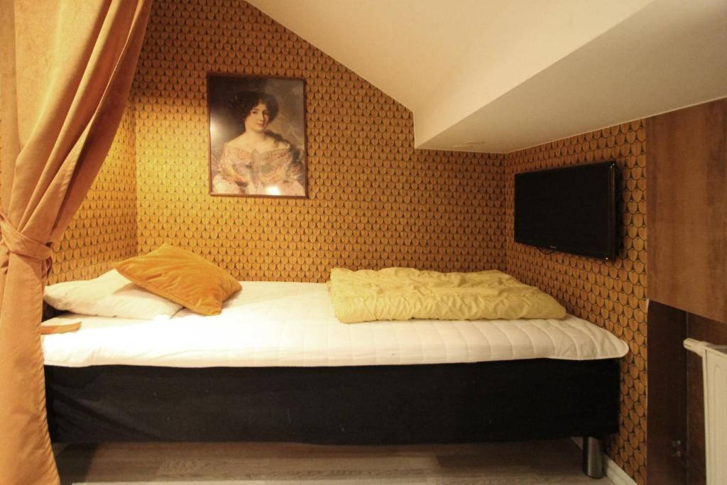 Postel nebo postele na pokoji v ubytování Skanstulls Boutique Hostel
